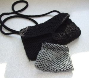 black hand bag and coin purse